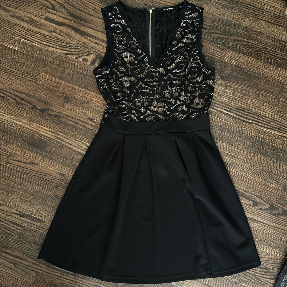 Black sleeveless dress with lace detailing